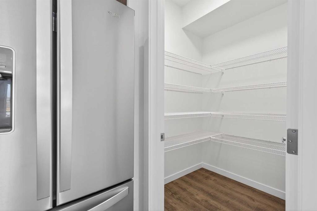 64 Creekside Drive Sw, Calgary, AB - Indoor With Storage