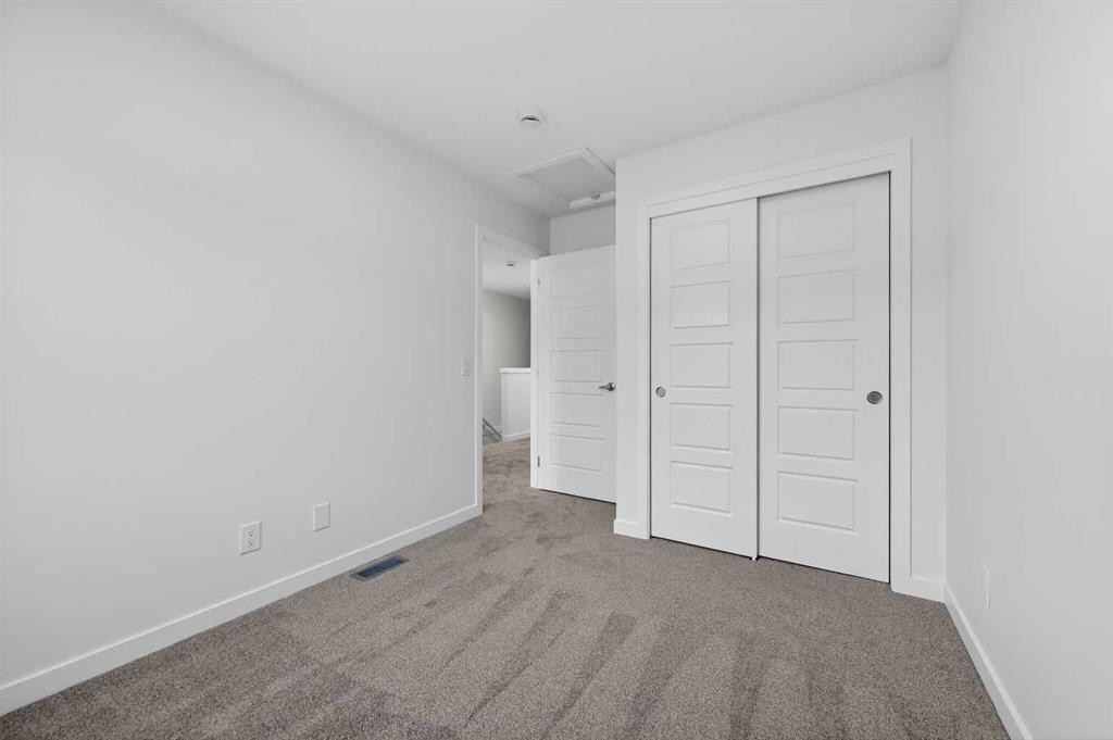 64 Creekside Drive Sw, Calgary, AB - Indoor Photo Showing Other Room