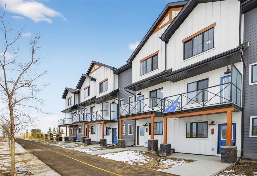 64 Creekside Drive Sw, Calgary, AB - Outdoor With Facade