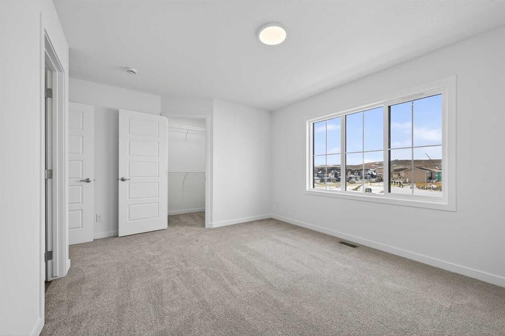 64 Creekside Drive Sw, Calgary, AB - Indoor Photo Showing Other Room