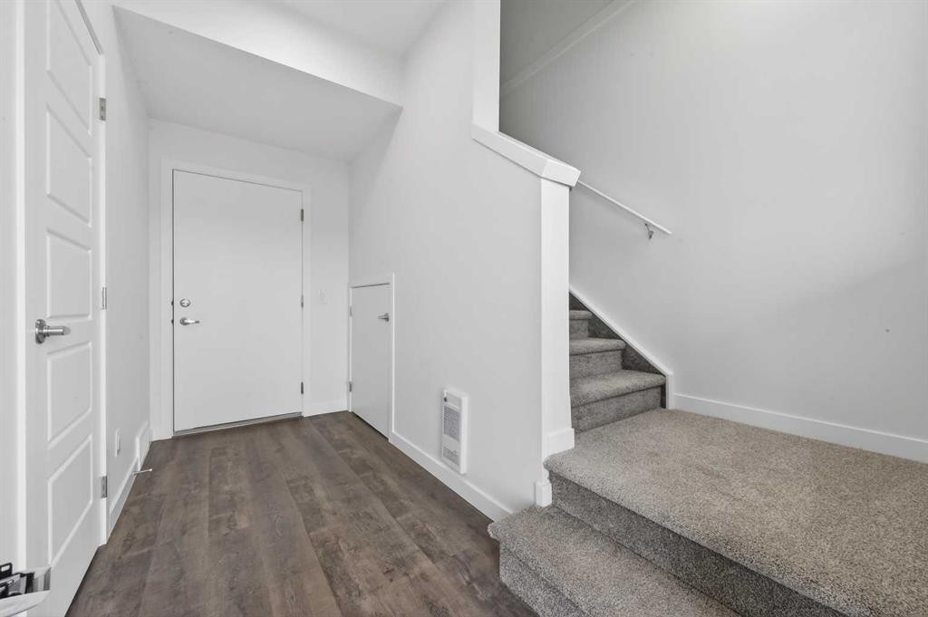 64 Creekside Drive Sw, Calgary, AB - Indoor Photo Showing Other Room