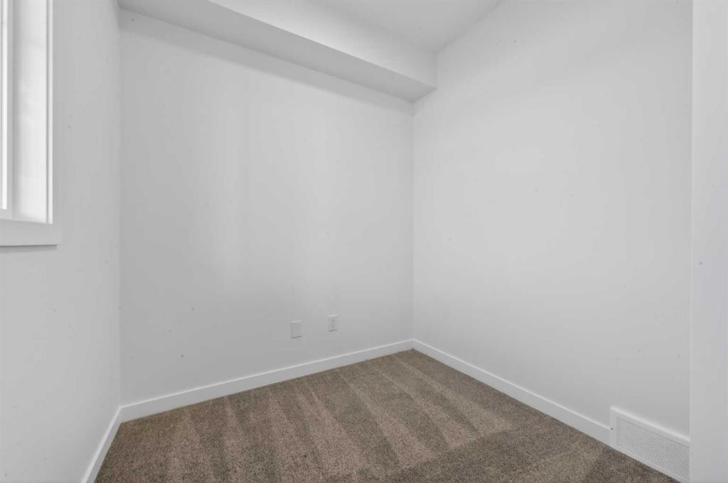 64 Creekside Drive Sw, Calgary, AB - Indoor Photo Showing Other Room