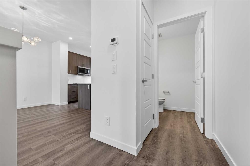 64 Creekside Drive Sw, Calgary, AB - Indoor Photo Showing Other Room