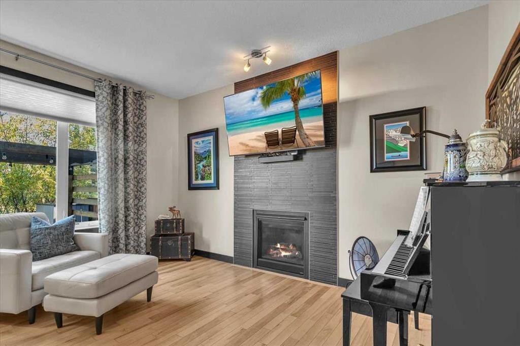 58 Valley Pointe Way Nw, Calgary, AB - Indoor Photo Showing Living Room With Fireplace