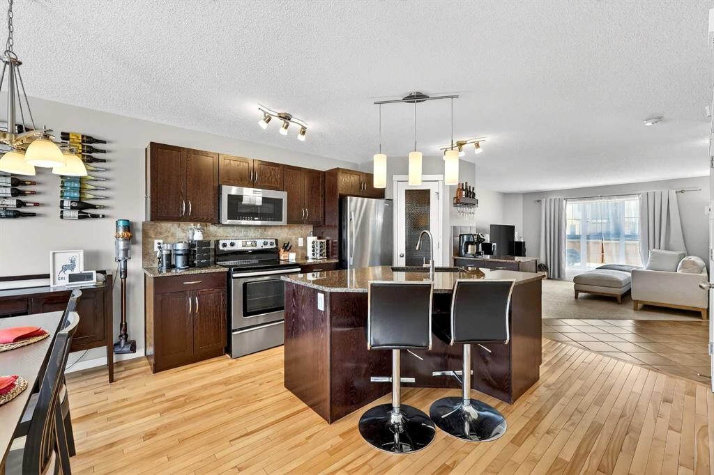 336 Cranberry Circle Se, Calgary, AB - Indoor Photo Showing Kitchen With Upgraded Kitchen