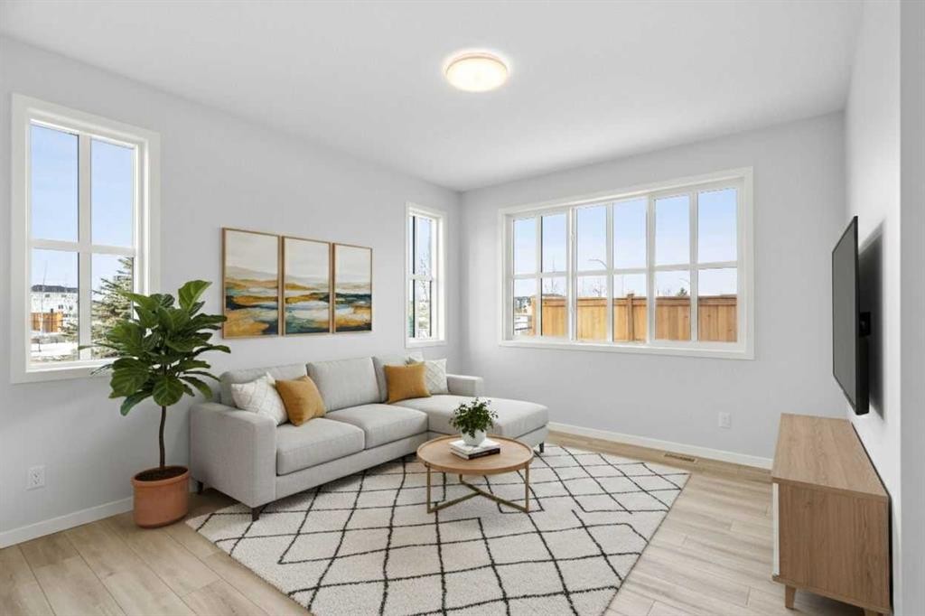 659 Buffaloberry Manor Se, Calgary, AB - Indoor Photo Showing Living Room