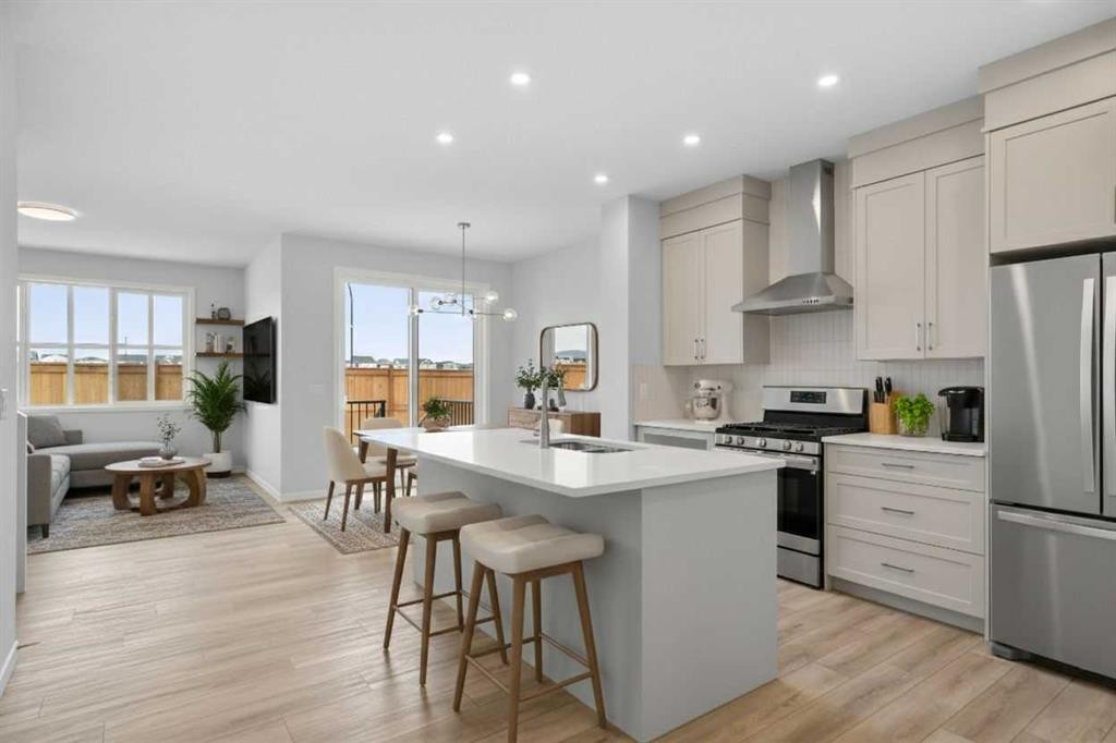 659 Buffaloberry Manor Se, Calgary, AB - Indoor Photo Showing Kitchen With Upgraded Kitchen