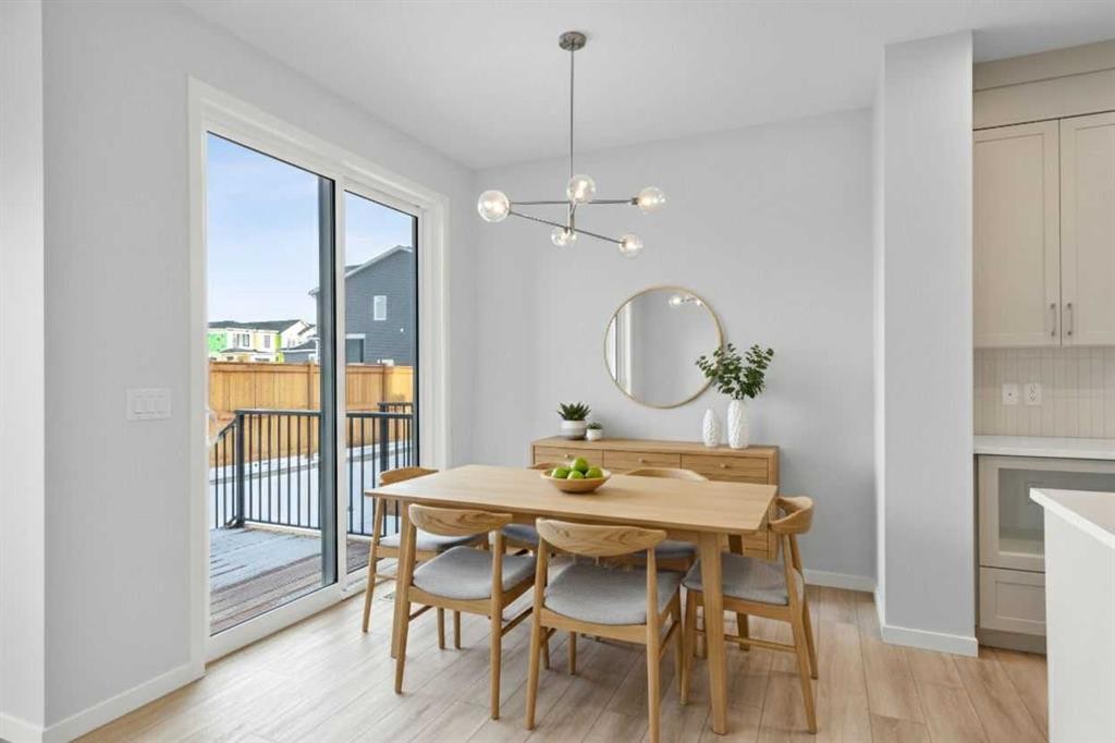 659 Buffaloberry Manor Se, Calgary, AB - Indoor Photo Showing Dining Room