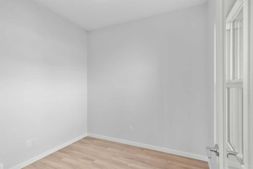 659 Buffaloberry Manor Se, Calgary, AB - Indoor Photo Showing Other Room