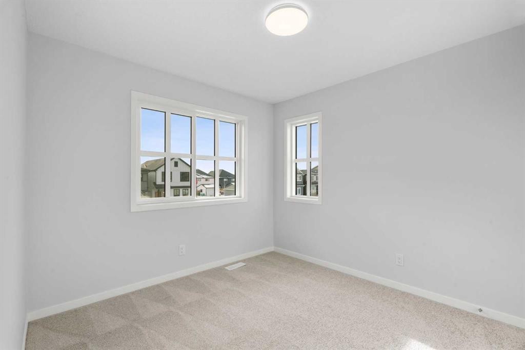 659 Buffaloberry Manor Se, Calgary, AB - Indoor Photo Showing Other Room