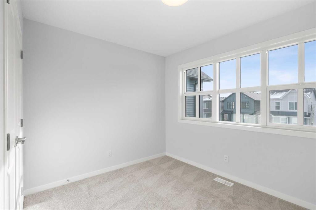 659 Buffaloberry Manor Se, Calgary, AB - Indoor Photo Showing Other Room