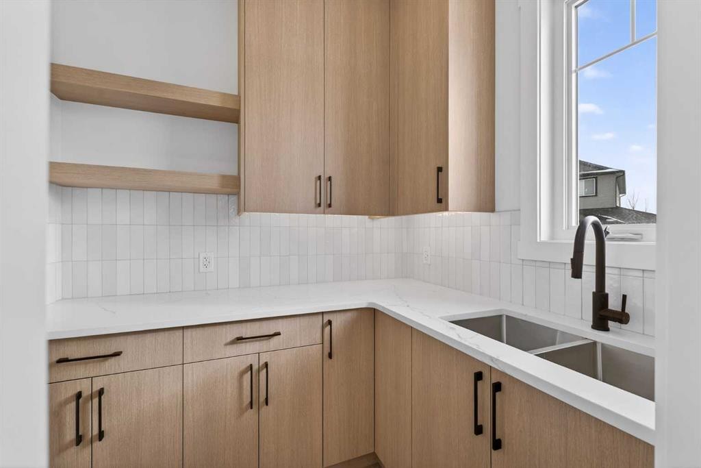 32 Lakes Estates Circle, Strathmore, AB - Indoor Photo Showing Kitchen With Double Sink
