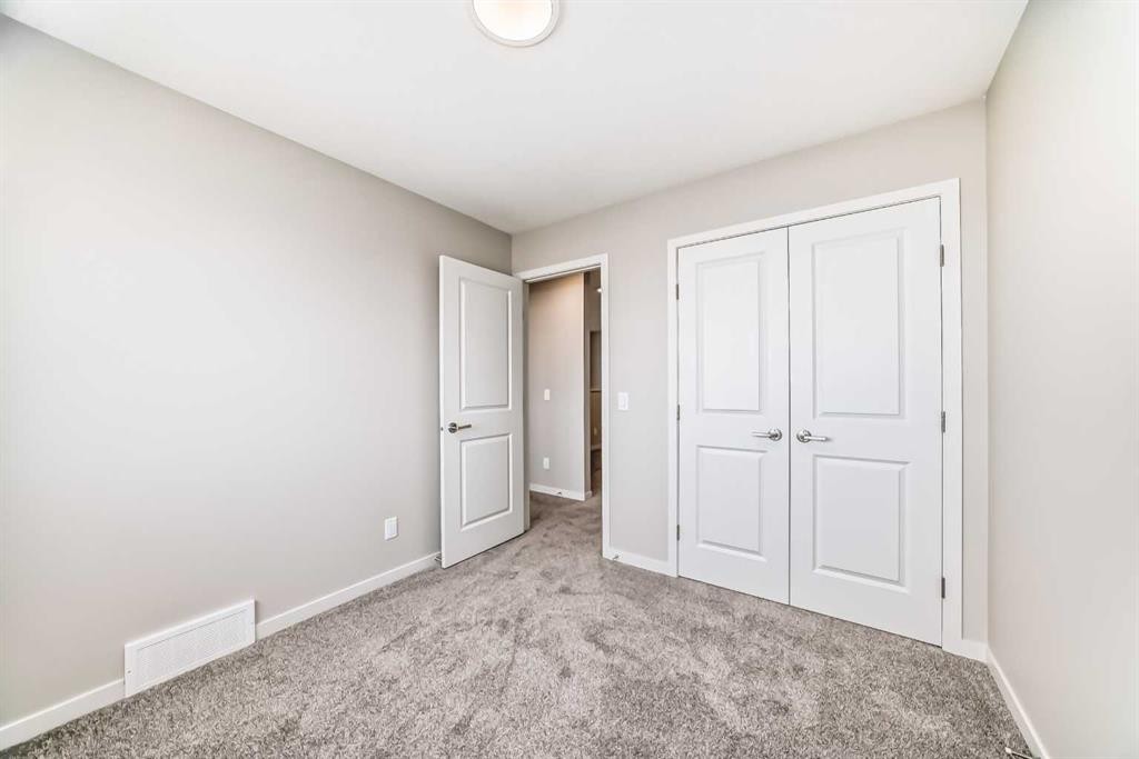 123 Sawgrass Gate Nw, Airdrie, AB - Indoor Photo Showing Other Room