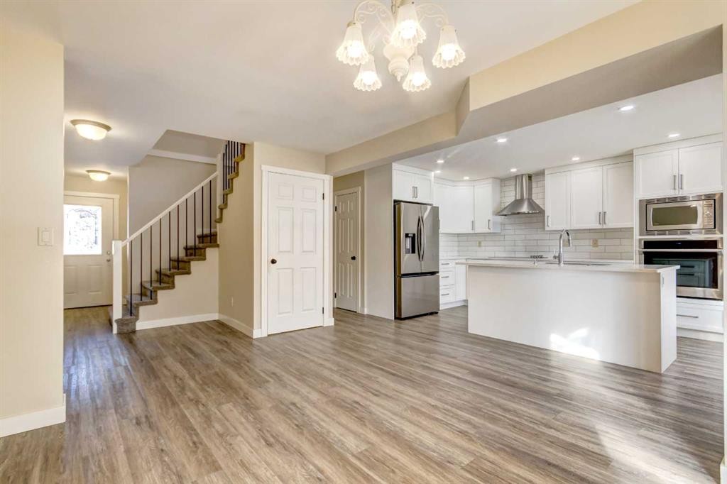 83 Hawkfield Crescent Nw, Calgary, AB - Indoor Photo Showing Kitchen With Stainless Steel Kitchen With Double Sink