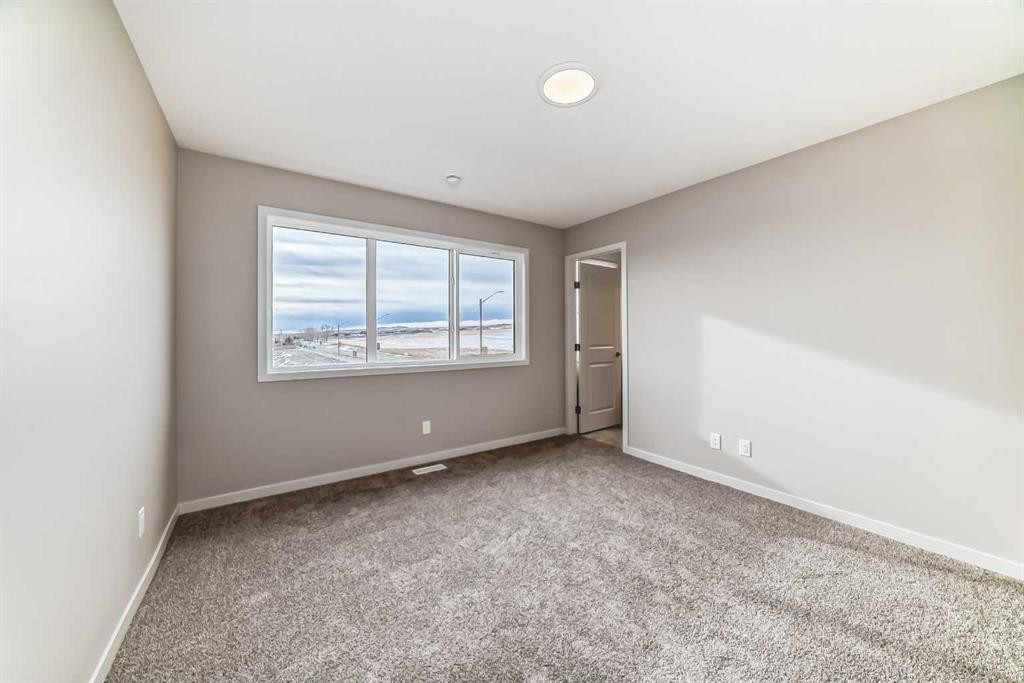 103 Sawgrass Gate Nw, Airdrie, AB - Indoor Photo Showing Other Room