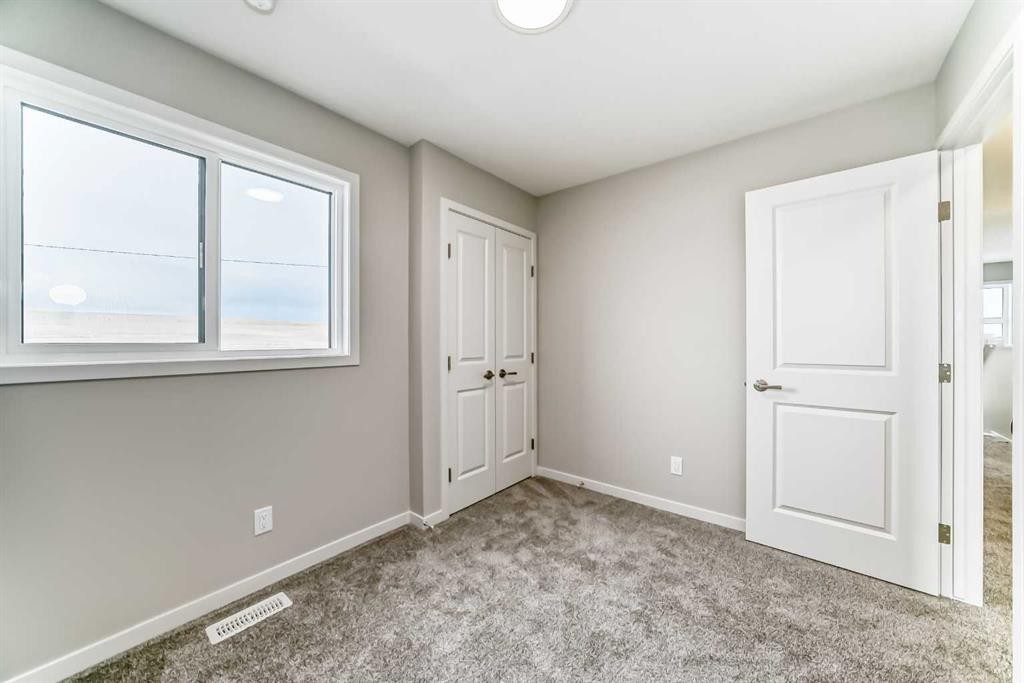 103 Sawgrass Gate Nw, Airdrie, AB - Indoor Photo Showing Other Room