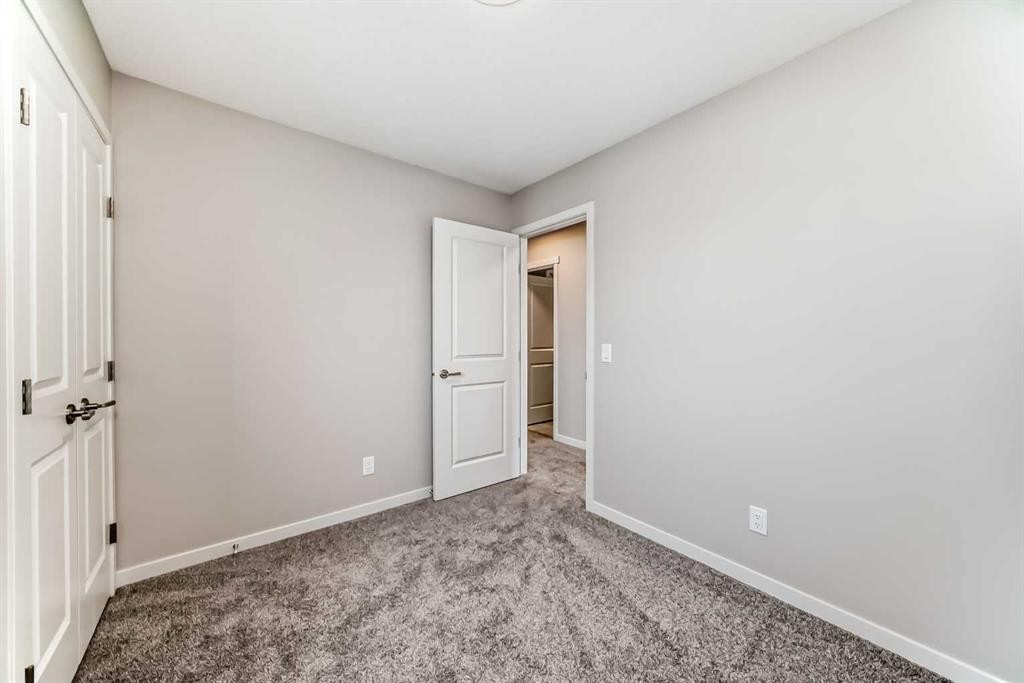103 Sawgrass Gate Nw, Airdrie, AB - Indoor Photo Showing Other Room
