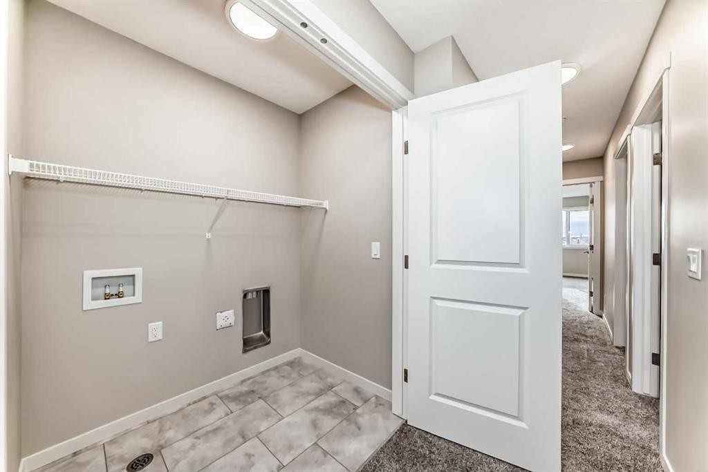 103 Sawgrass Gate Nw, Airdrie, AB - Indoor Photo Showing Other Room