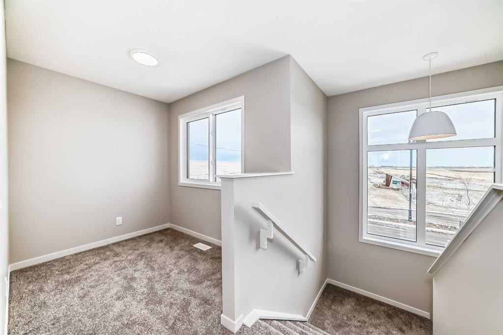 103 Sawgrass Gate Nw, Airdrie, AB - Indoor Photo Showing Other Room