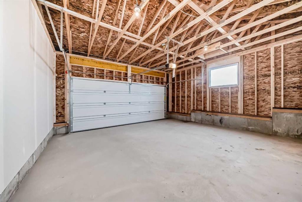 103 Sawgrass Gate Nw, Airdrie, AB - Indoor Photo Showing Garage