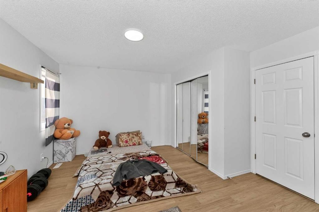 247 Taracove Estate Drive Ne, Calgary, AB - Indoor Photo Showing Bedroom