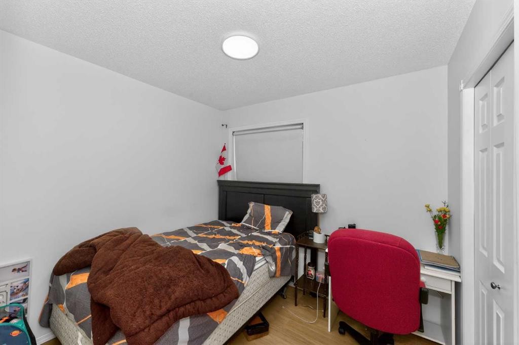 247 Taracove Estate Drive Ne, Calgary, AB - Indoor Photo Showing Bedroom