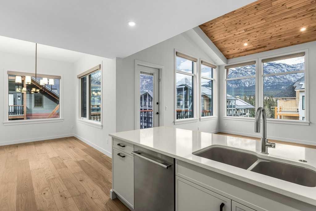 407-1505 Spring Creek Gate, Canmore, AB - Indoor Photo Showing Kitchen With Double Sink