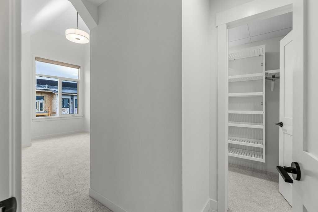 407-1505 Spring Creek Gate, Canmore, AB - Indoor Photo Showing Other Room