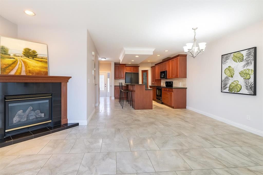 1421 40 Street Sw, Calgary, AB - Indoor Photo Showing Living Room With Fireplace