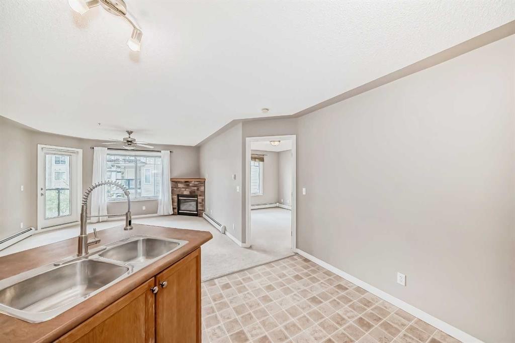 303-369 Rocky Vista Park Nw, Calgary, AB - Indoor Photo Showing Kitchen With Double Sink