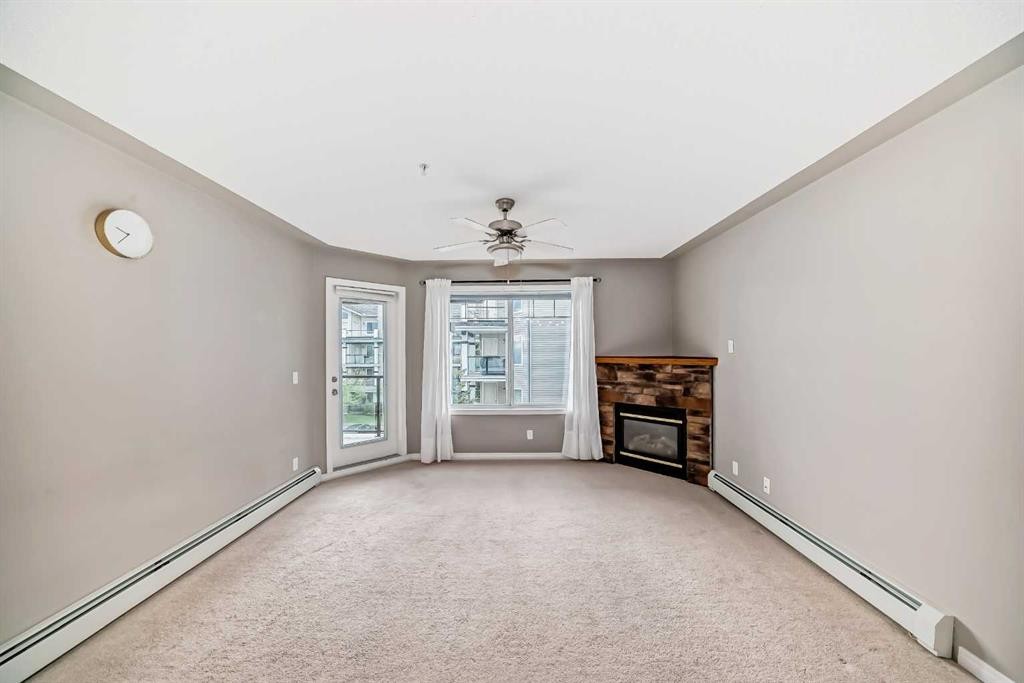 303-369 Rocky Vista Park Nw, Calgary, AB - Indoor With Fireplace