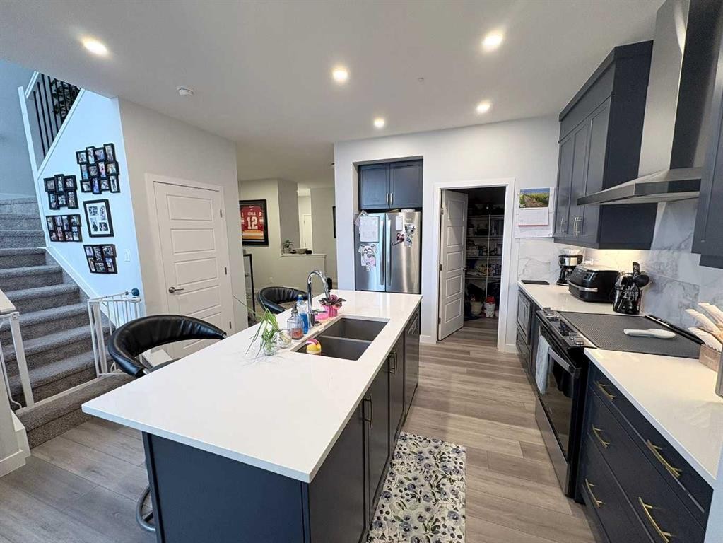229 Edith Road Nw, Calgary, AB - Indoor Photo Showing Kitchen With Double Sink