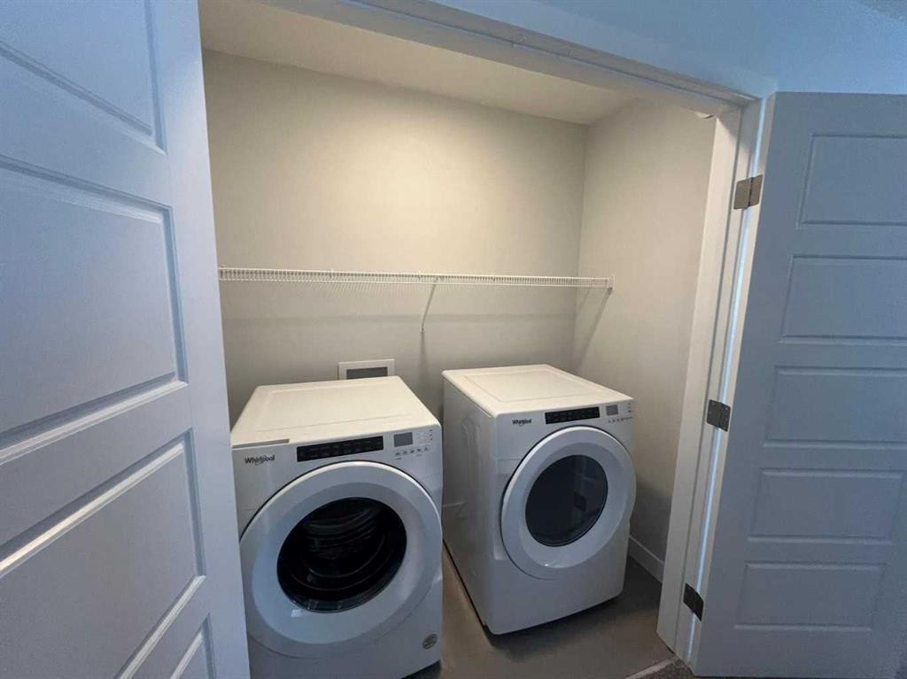 229 Edith Road Nw, Calgary, AB - Indoor Photo Showing Laundry Room