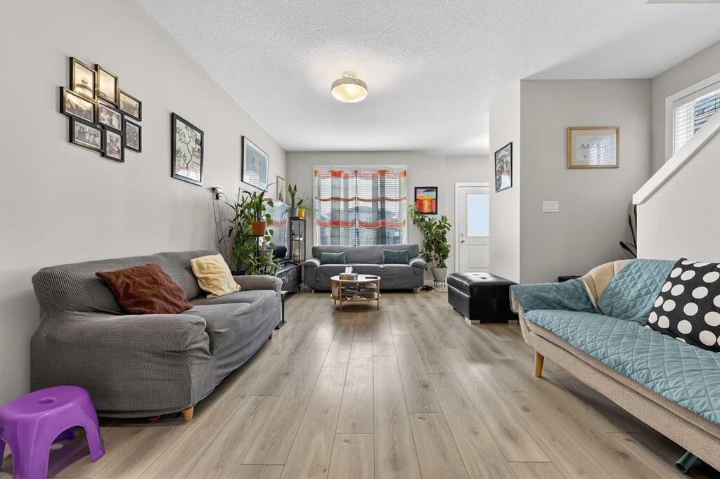 132 Corner Meadows Gate Ne, Calgary, AB - Indoor Photo Showing Living Room