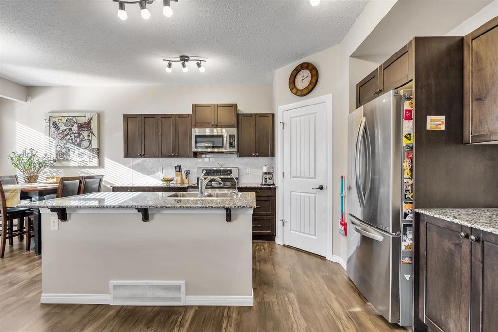 31 Walden Court Se, Calgary, AB - Indoor Photo Showing Kitchen With Stainless Steel Kitchen With Upgraded Kitchen