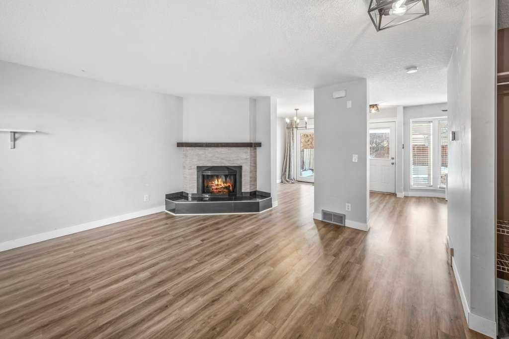 2140 146 Avenue Se, Calgary, AB - Indoor Photo Showing Living Room With Fireplace