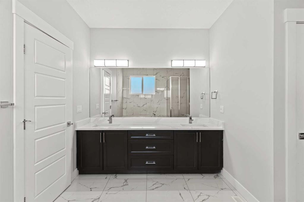 111 Kinniburgh Place, Chestermere, AB - Indoor Photo Showing Bathroom