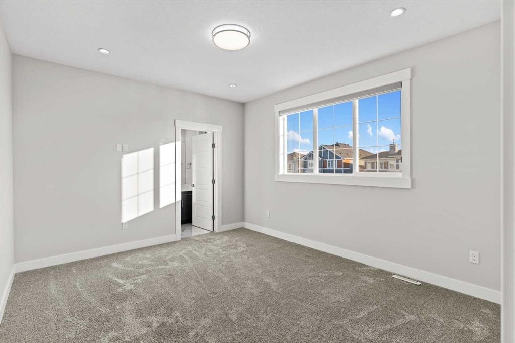 111 Kinniburgh Place, Chestermere, AB - Indoor Photo Showing Other Room
