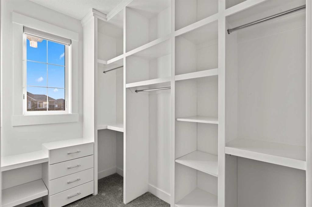 111 Kinniburgh Place, Chestermere, AB - Indoor With Storage
