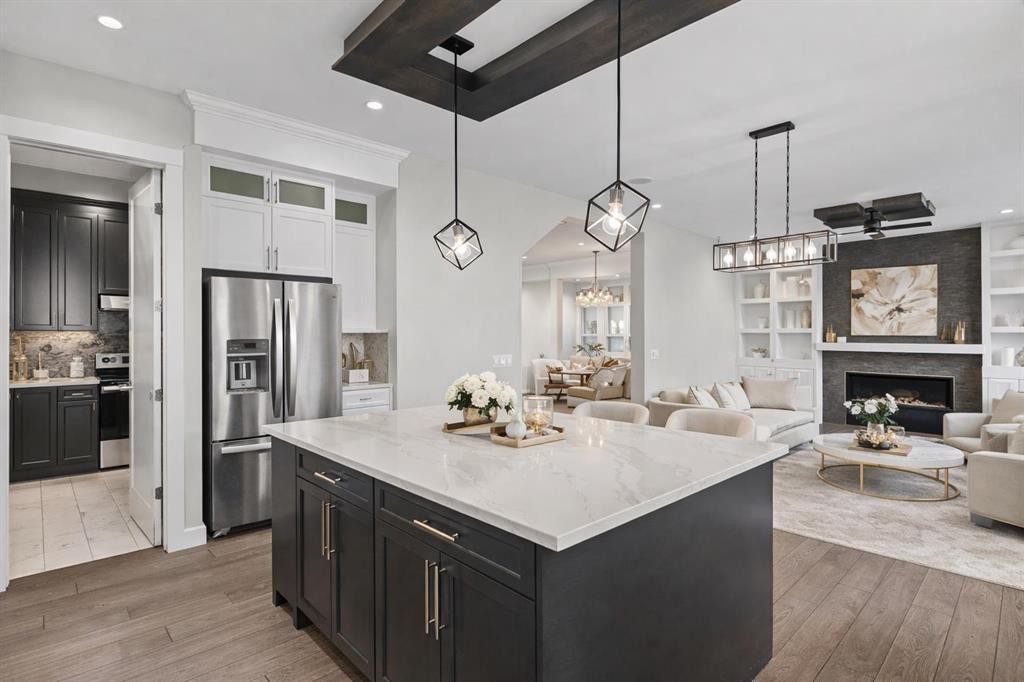 111 Kinniburgh Place, Chestermere, AB - Indoor Photo Showing Kitchen With Stainless Steel Kitchen With Upgraded Kitchen