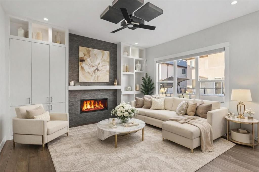 111 Kinniburgh Place, Chestermere, AB - Indoor Photo Showing Living Room With Fireplace