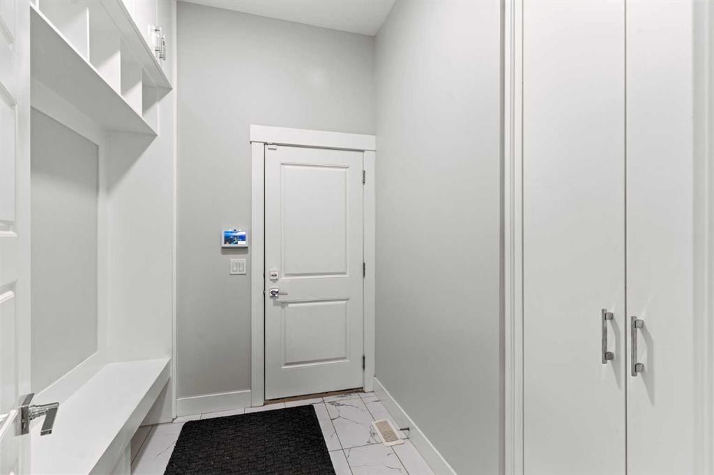 111 Kinniburgh Place, Chestermere, AB - Indoor Photo Showing Other Room