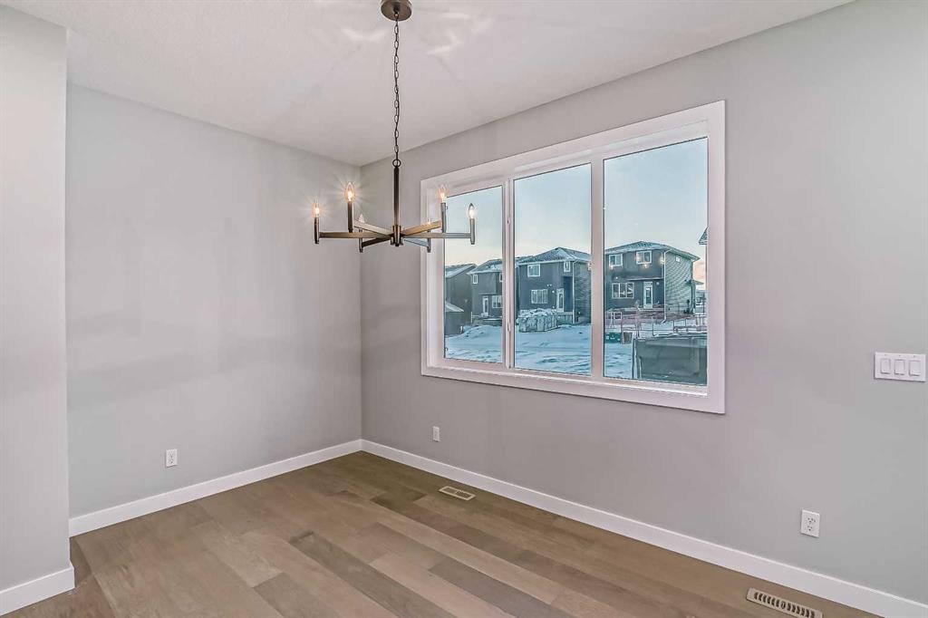 39 Agate Road, Cochrane, AB - Indoor Photo Showing Other Room