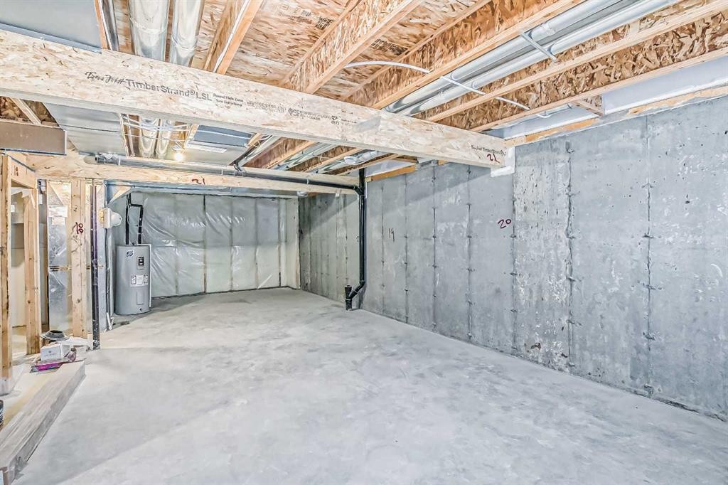 39 Agate Road, Cochrane, AB - Indoor Photo Showing Basement