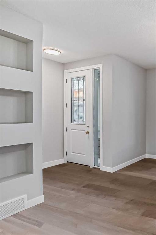 39 Agate Road, Cochrane, AB - Indoor Photo Showing Other Room