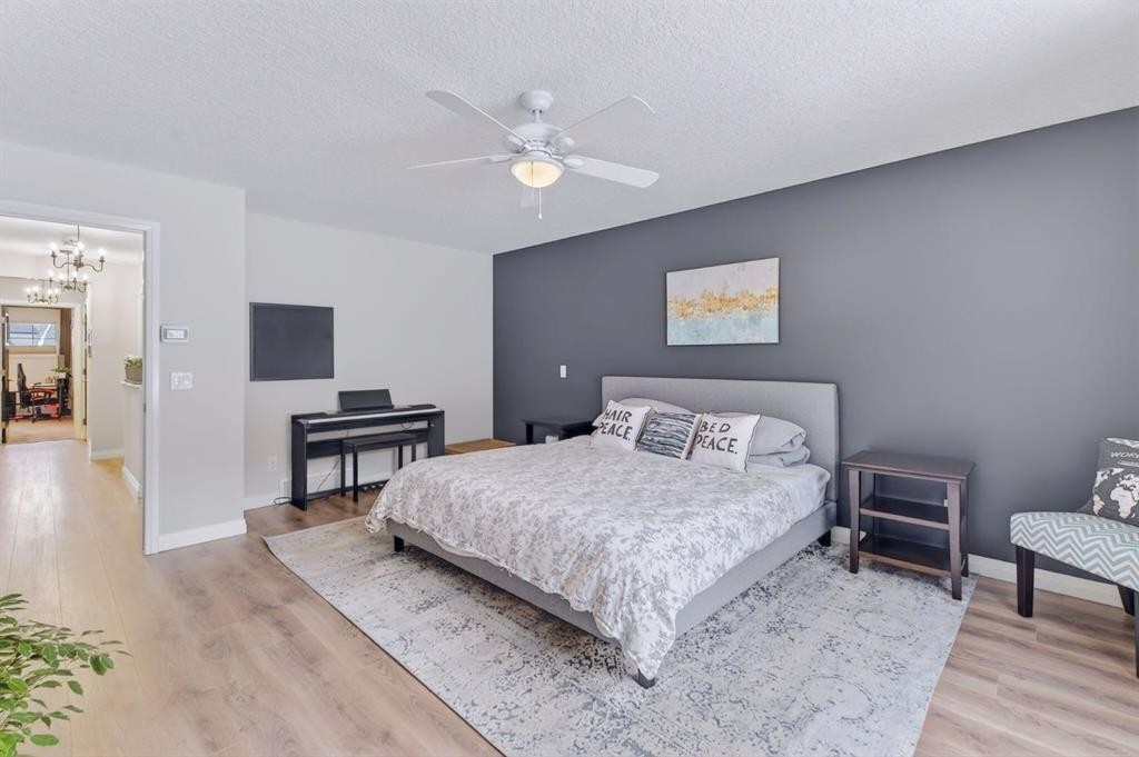 105 Riviera Crescent, Cochrane, AB - Indoor Photo Showing Bedroom