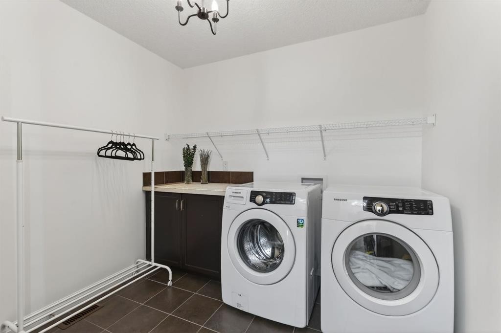 105 Riviera Crescent, Cochrane, AB - Indoor Photo Showing Laundry Room