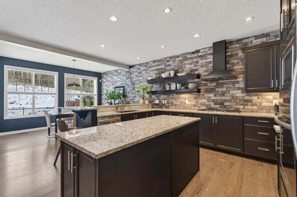 105 Riviera Crescent, Cochrane, AB - Indoor Photo Showing Kitchen With Upgraded Kitchen