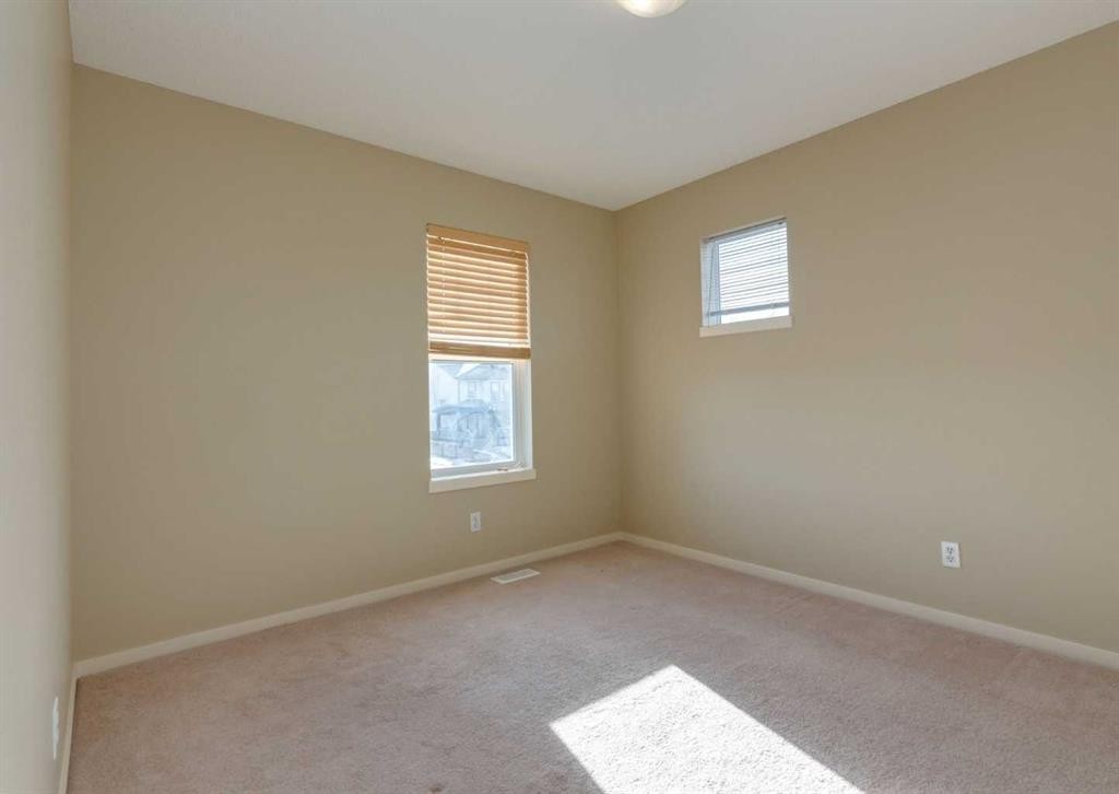 236 Silverado Drive Sw, Calgary, AB - Indoor Photo Showing Other Room