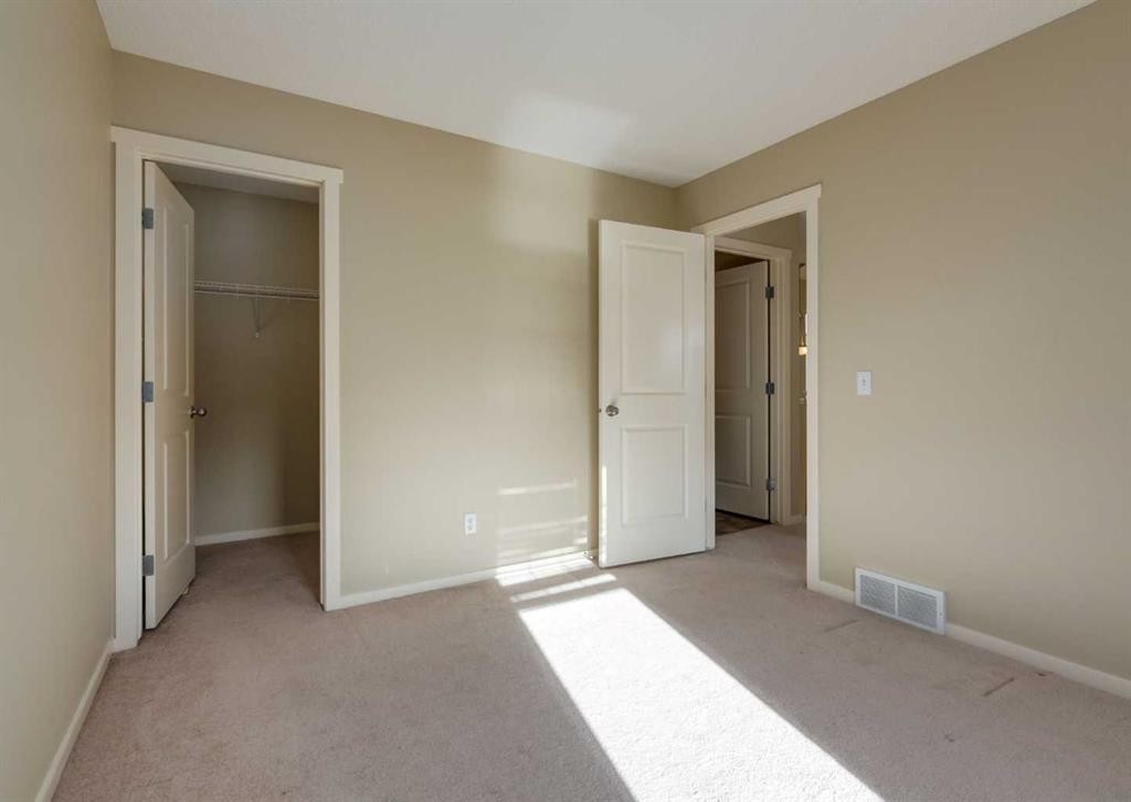 236 Silverado Drive Sw, Calgary, AB - Indoor Photo Showing Other Room